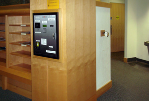 Cash to card machine in wall on first floor of library