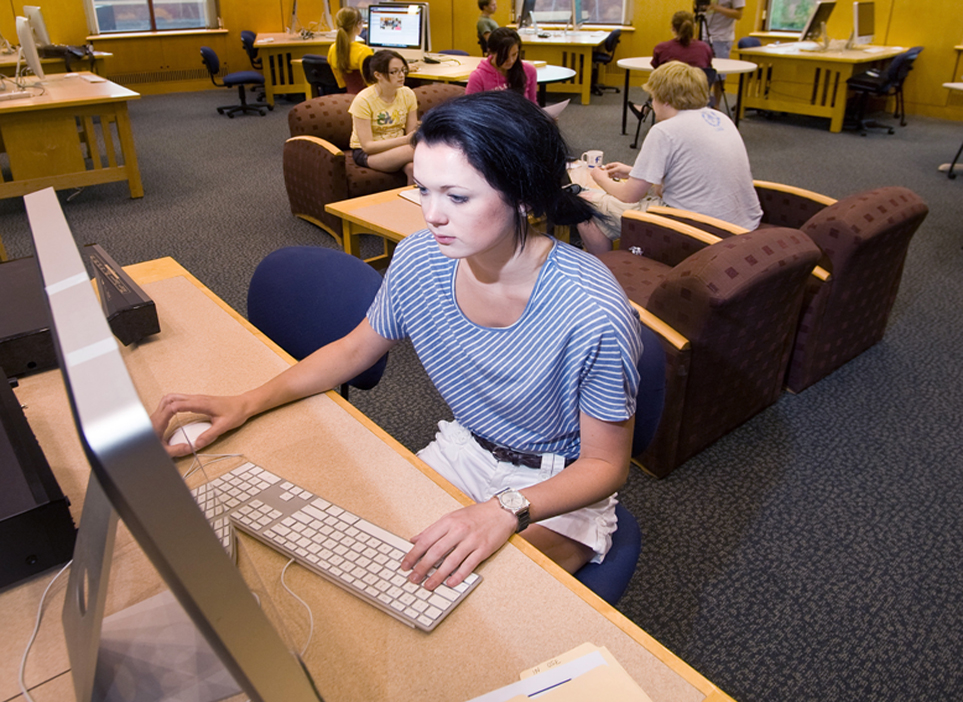 student at library PC