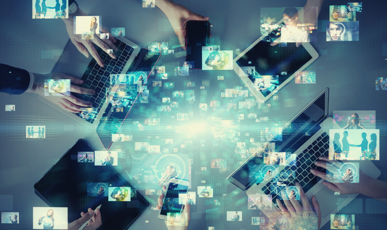 people using laptops, the image is overlaid by graphics of streaming video