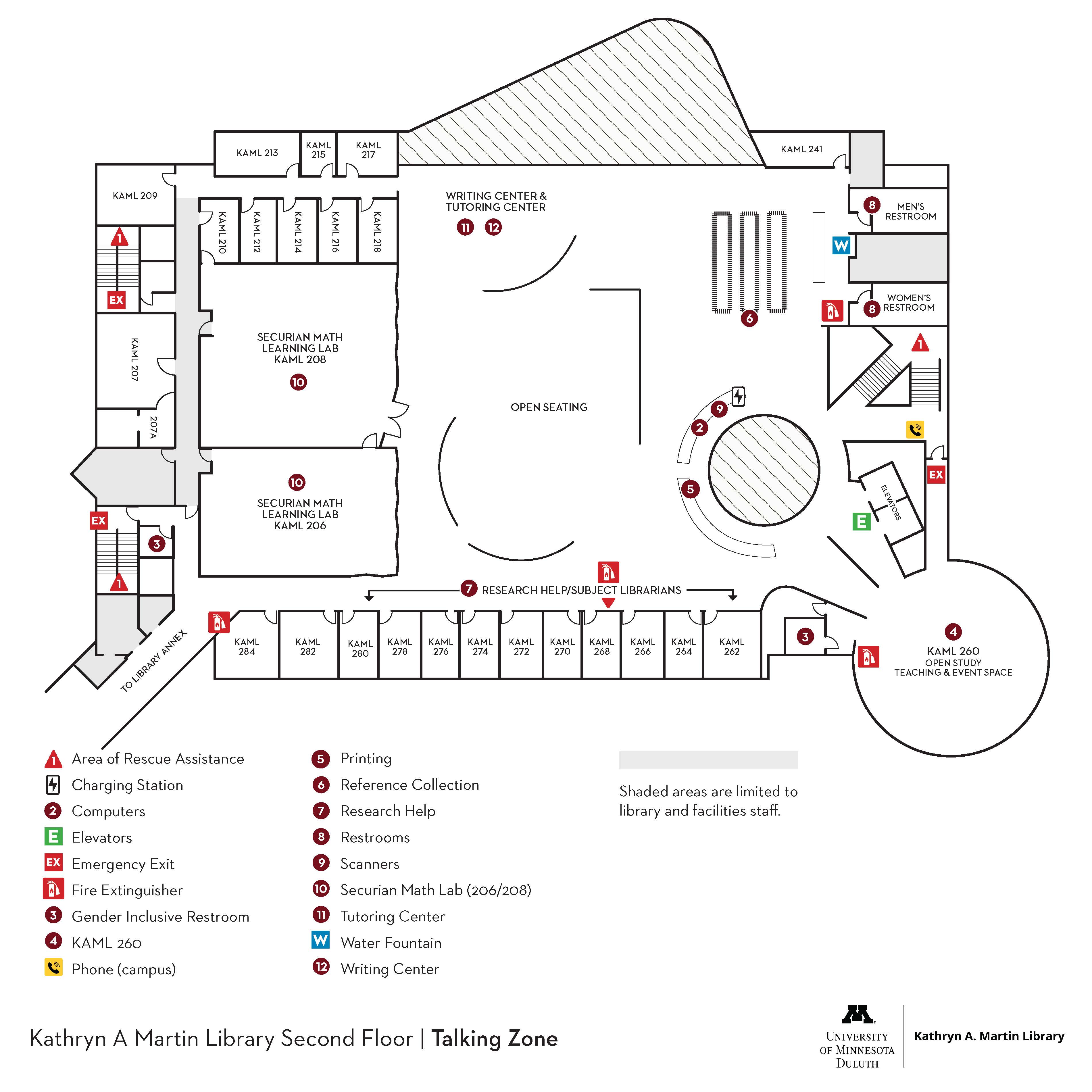 Map of the second floor of Kathryn A. Martin Library at the University of Minnesota Duluth, indicating room layouts, facilities like restrooms and elevators, and emergency exits.