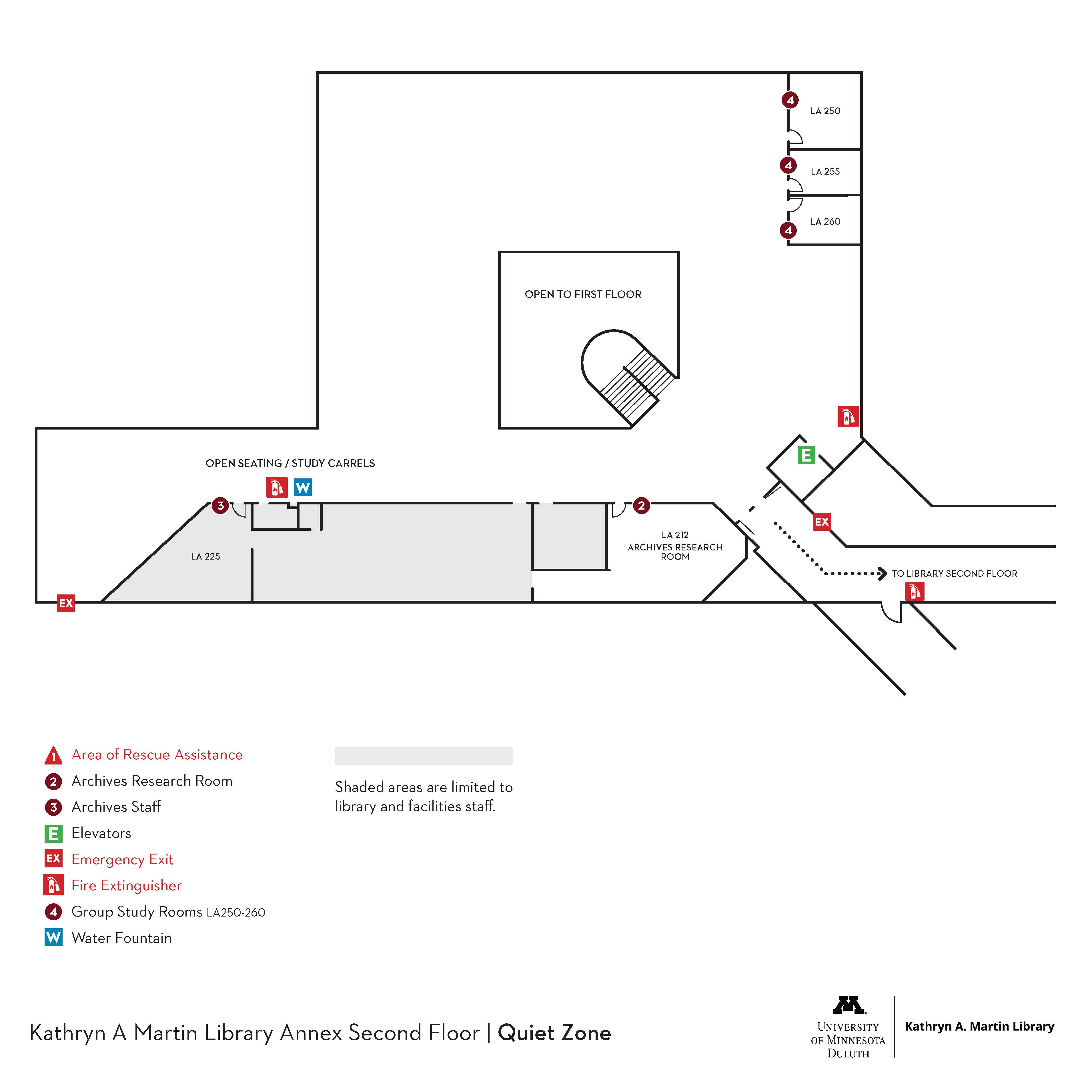 Map of the annex second floor of Kathryn A. Martin Library at the University of Minnesota Duluth, indicating room layouts, facilities like restrooms and elevators, and emergency exits.